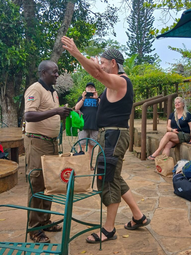 Mbutu director with a guest in the Shimba Hills