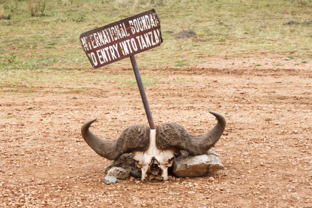 Travellers crossing the Kenya and Tanzania border on safari